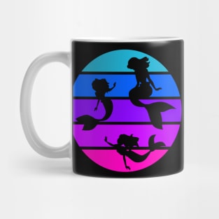 Mermaids Swimming in a Pink, Purple, and Blue Ocean Mug